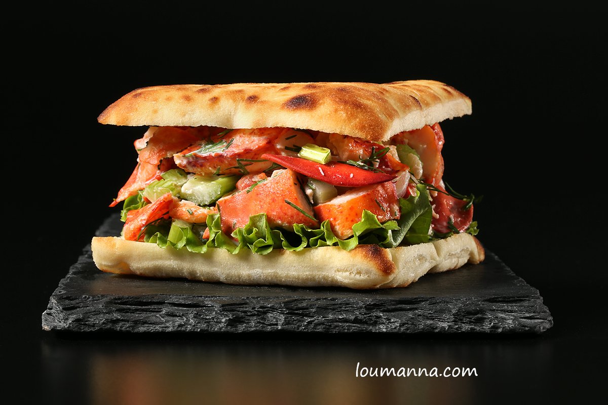 "Tasty Tuesday" is Back with a Black Background displaying a Brooklyn Bred Lobster on a Bistro Bun! 🎉👌
Now that's truly a scrumptious mouthful!!! 👍🎊👏
FUGGEDABOUDIIIIIT!!!😱