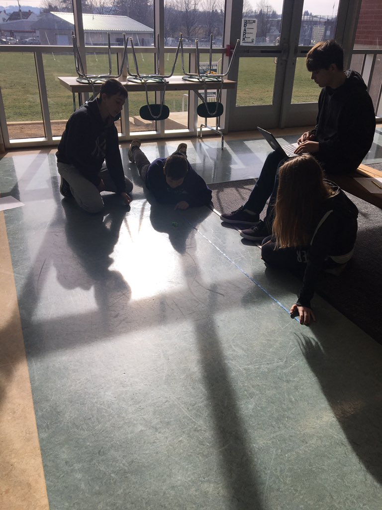 7th grade students learning how to calculate rate while practicing their measuring skills using toy cars. #wyproud