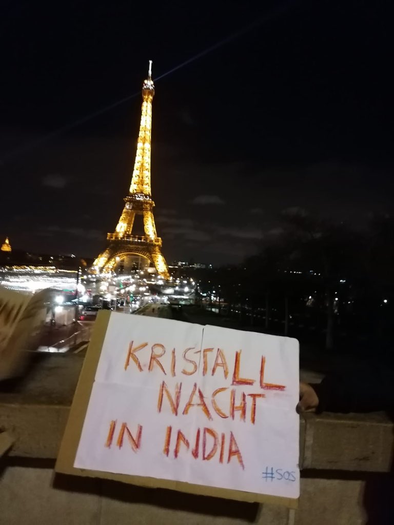 kmadhuresh's tweet photo. A lot of people in Delhi keeping vigil tonight and so are many around the world. @sachinme and friends from @paris_alliance  keeping vigil in front of Effiel tower Paris. All strength to them. Desh bahut pyaara hai, jalane mat do... #Solidarity #DelhiRiots https://t.co/HwBLRxlzvw