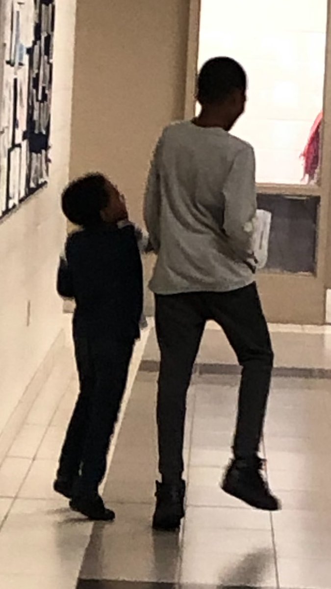 RossDrive's tweet photo. Be still my heart.  One of our littlest guys was having a hard time.  One of our older students took him under his wing.  He walked him back to class and had him smiling and laughing.  We have such great kids and wonderful leaders! https://t.co/a5jOSQQ9dB