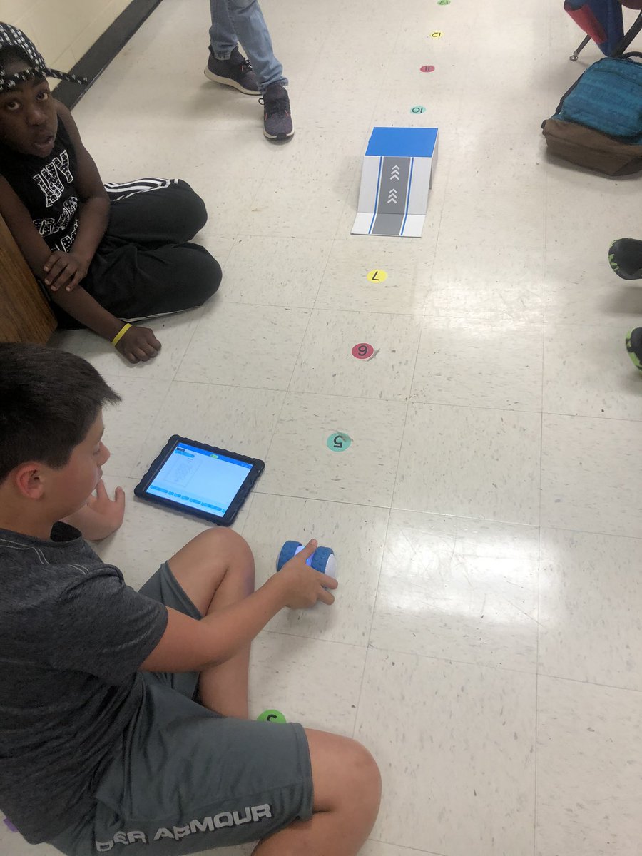 asp_young's tweet photo. 2-5 grade learned how to program the Ollies to make it up the ramps. They also programmed the robot to try and make a Hole n One! #journeytoAWE #LearnGrowLead #engageCobb @bakerelembears @SteamyBakerBear https://t.co/PsJDCiX7Kb