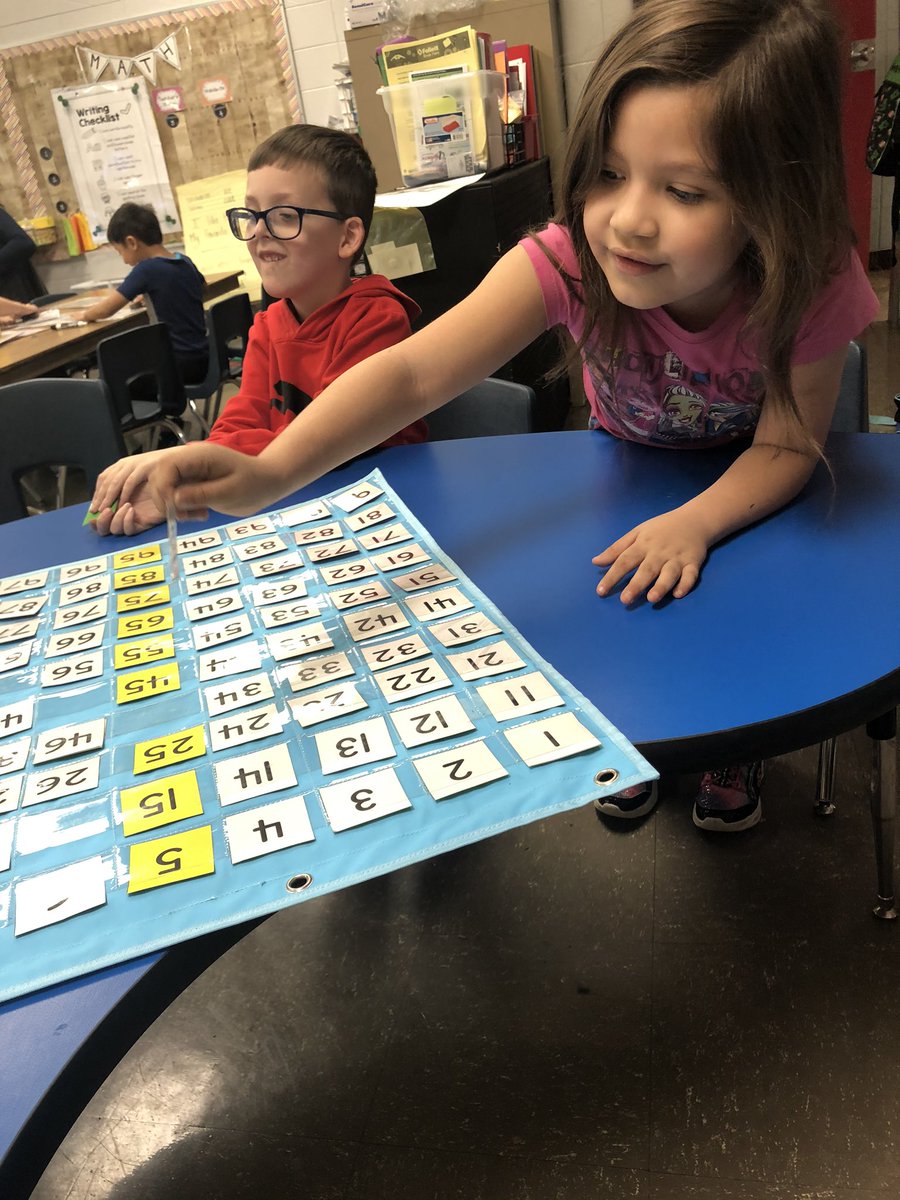 MrsMoore1stgrd's tweet photo. We ❤️ working together to fill in the 100 chart! @KlondikeLane https://t.co/3IpBgNjBMh