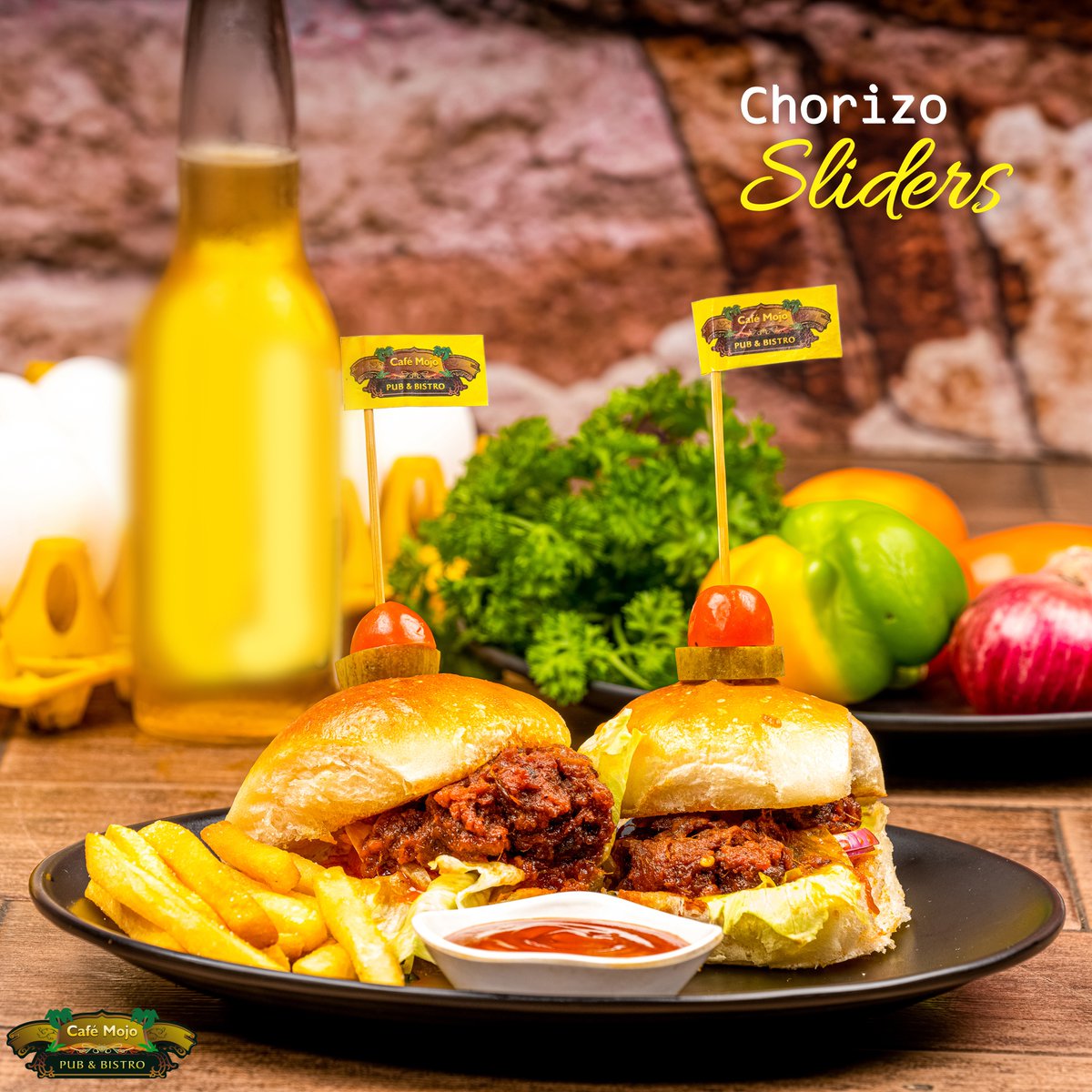 When in Goa, the famous Goan Chorizo Pao is BAE.

This juicy, spicy and well marinated in traditional Goan masala and sun dried pieces of pork, sautéd with Onions and stuffed in soft fluffy bun, the "Chorizo Slider" is one of Café Mojo - must try...