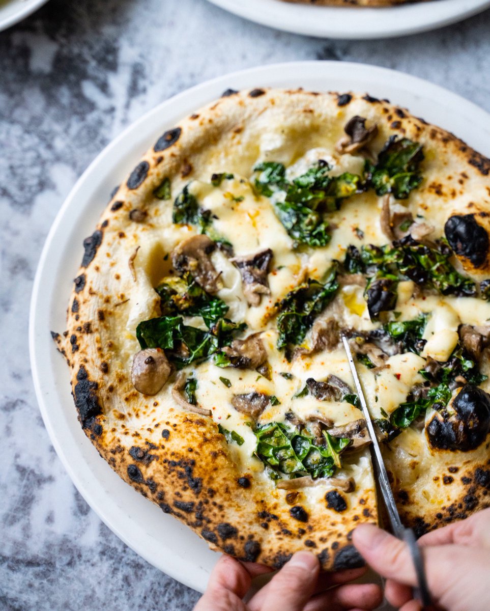 Cavolo Nero e Funghi—the perfect way to eat your veggies and pizza at the same time.