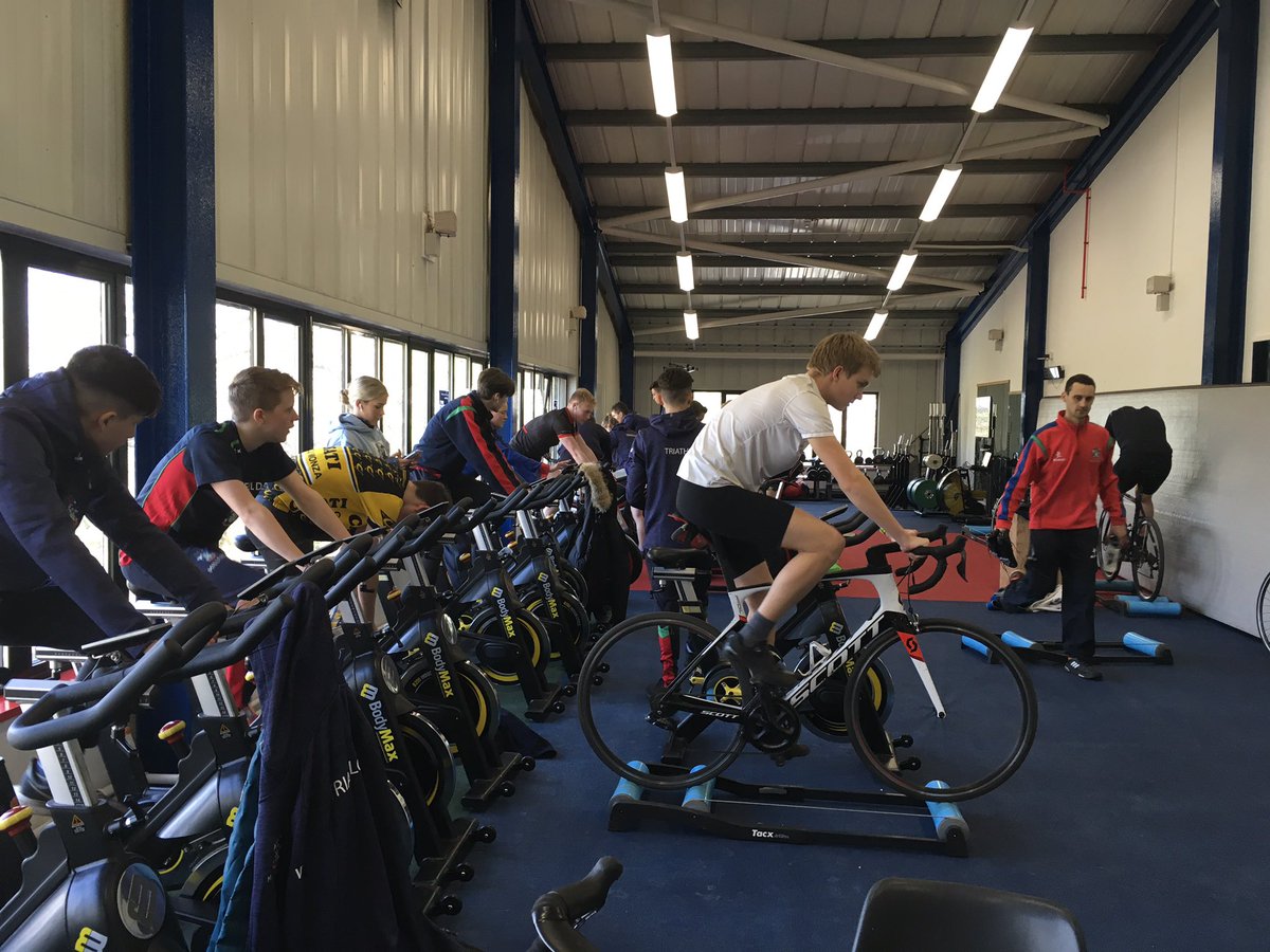 MillfieldRdTri's tweet photo. No hands rollers, steady riding, track bike rollers, intervals and multi brick sessions all going on while it’s too windy to ride out. #Triathlon #cycling #bebrilliant https://t.co/AkvLWrHqpv