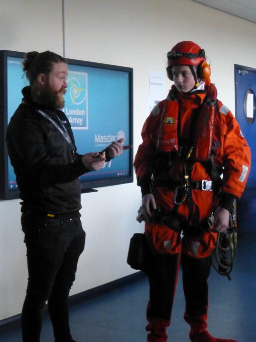 James of Orsted, WT4  specialist wind turbine technician helps Shayne experience "office" attire for today's wind technician @OrstedUK@MerseyEureka @TPJWoolley@jaeleholmfirth   Well done, Mosslands old Boy, Tom Woolley helping bring Mersey Eureka home.