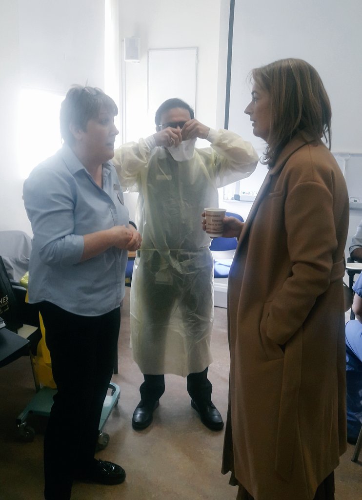 ConnollyNursing's tweet photo. The infection prevention and control team working diligently to use ever opportunity to educate staff on Personal Protective Equipment (PPE) donning and doffing. #CoronavirusOutbreak #ppewithmask https://t.co/8xqa7nOKl6