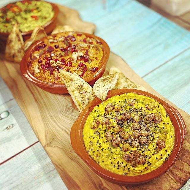 Trio of dips with za’atar flatbread crisps. Here we made golden beetroot hummus with crispy chickpeas, nigellas seeds and sumac, muhammara and a feta and pistachio dip. Great for a fun sharing menu! . . . . . #dips #trioofdips #meze #mezetable #mezefood … ift.tt/381vX1Z