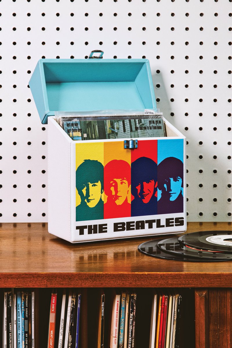 Get first dibs on our new THE BEATLES - Hard Day’s Night 45 Record Case. Stash and tote your precious 7” vinyl records with this handy faux leather carry case with The Beatles artwork. Heavy dutylatches and hinges will keep discs safe and secure even during a hard day’s night.