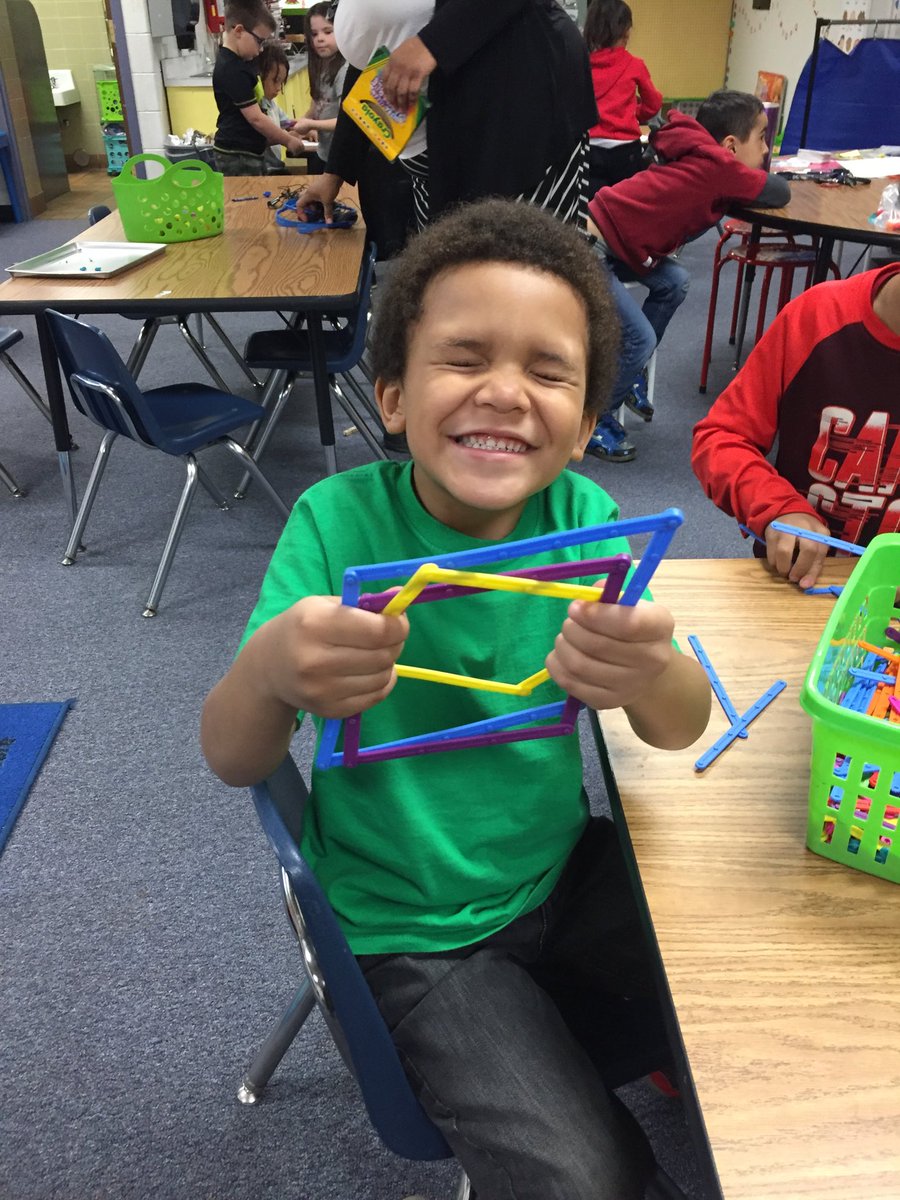 The joy of hands on learning in kindergarten ⁦@SpotswoodElem⁩. He was so excited to explain how the colors worked to make different size squares. #joyofteaching