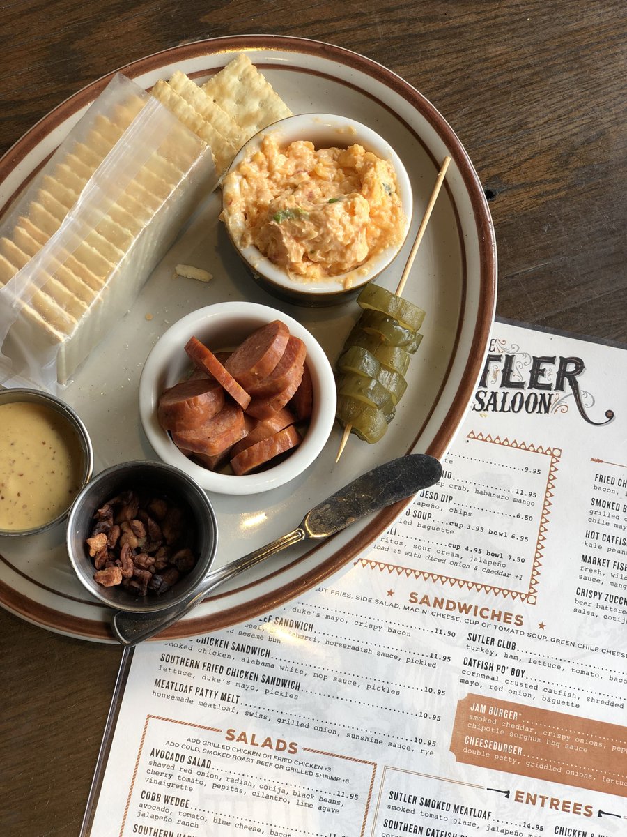 Getting in the mood for spring with our Picnic Plate -- whipped pimento cheese, andouille sausage, Wickles pickles, Bearwalker brown mustard, and crackers.