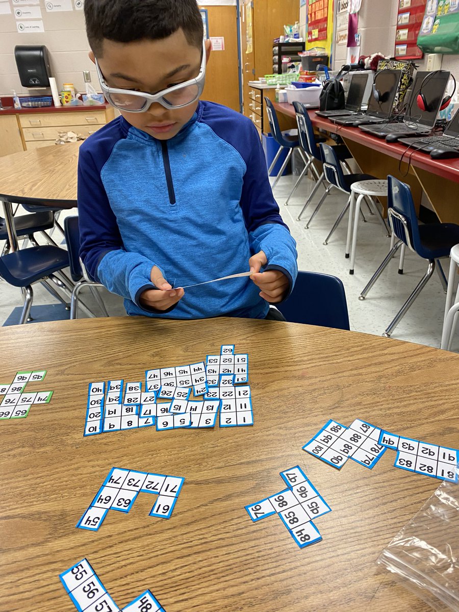 MrsPalcher's tweet photo. We have been learning a lot about 100 charts! We are become 100 chart puzzle experts! @AldrinEagles @FCPSRegion1 #mathtime #100schart #numbersense #handsonlearning #problemsolving https://t.co/AJyEwSV3FA