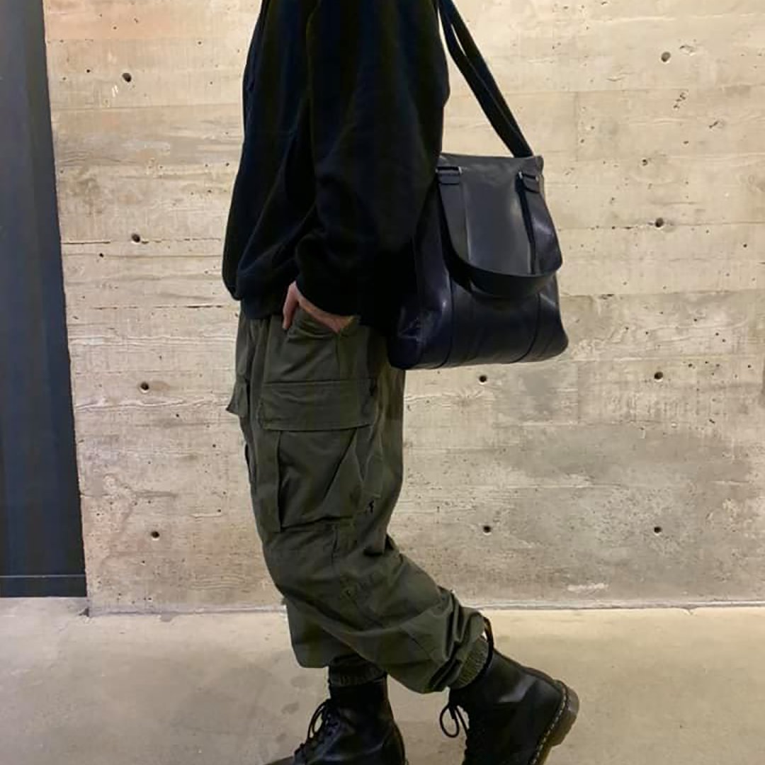 MUSH-HAVE | Once you own the WE 19 Small Vertical #Weekend Bag, you won’t be able to leave without it. Available #online in grey color. 👀 Picture taken at our #Vancouver location. Shop now: bit.ly/32r9ABO
