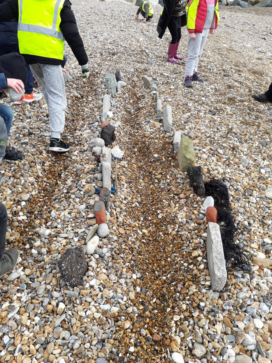 Tirzahswt's tweet photo. Lovely day in the sun making shell museums, mini stone henges and some impressive sea defences! We also found some treasures washed up from the storms #wildbeach #ledermantrainee @BHeetweets https://t.co/hegZAdK1T1