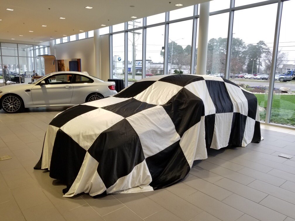 Can anyone guess what’s under the checkered flag at Checkered Flag BMW? We will be unveiling it tonight! 🏁 #WhereWinnersBuy
