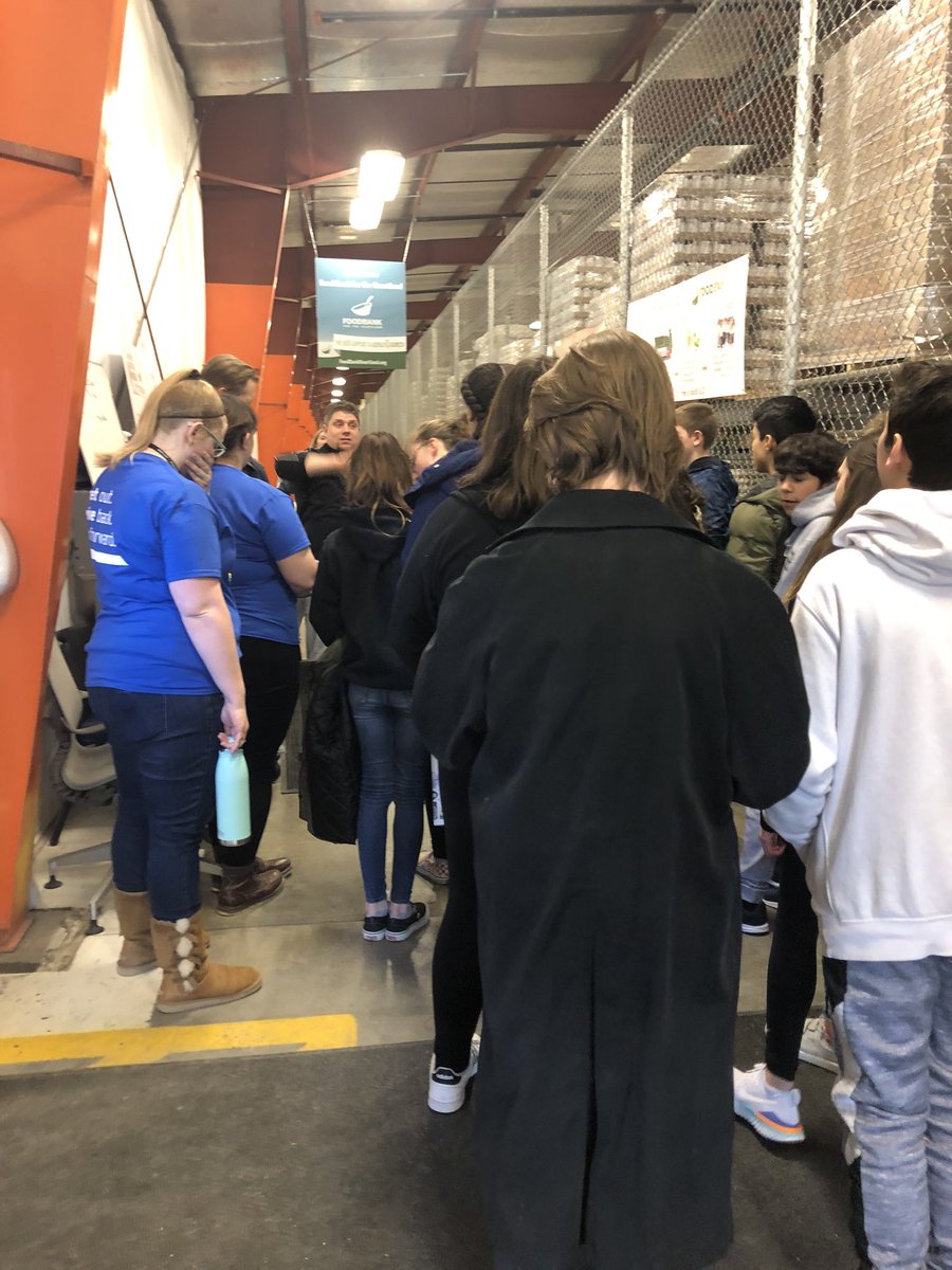ops_mccauley's tweet photo. Beveridge National Honor Society students are learning about the Heartland Food Bank and giving their time to help. https://t.co/5tTZQu4FtE