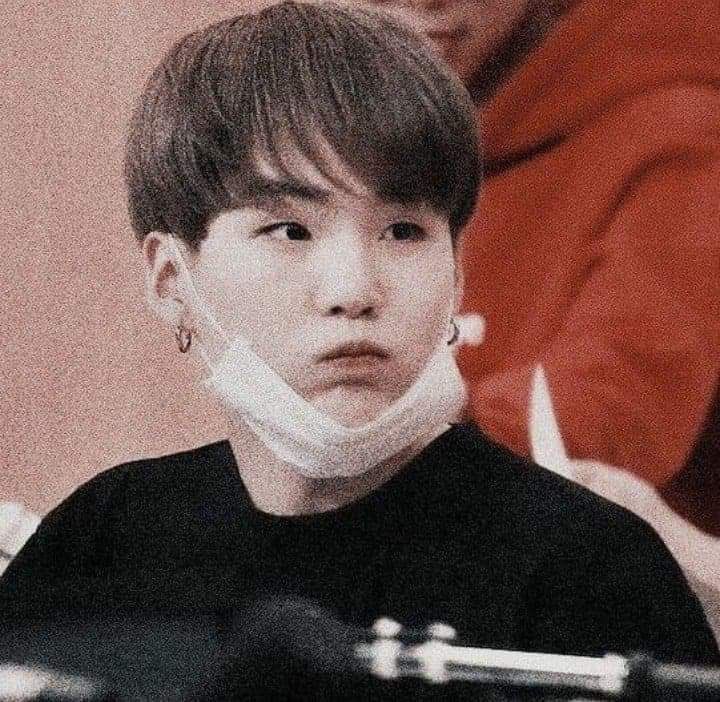 Yoongi with his mask on his chin because it’s so cute I’m 