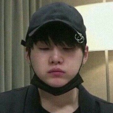 Yoongi with his mask on his chin because it’s so cute I’m 