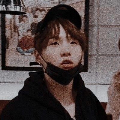 Yoongi with his mask on his chin because it’s so cute I’m 