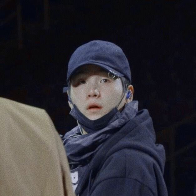 Yoongi with his mask on his chin because it’s so cute I’m 