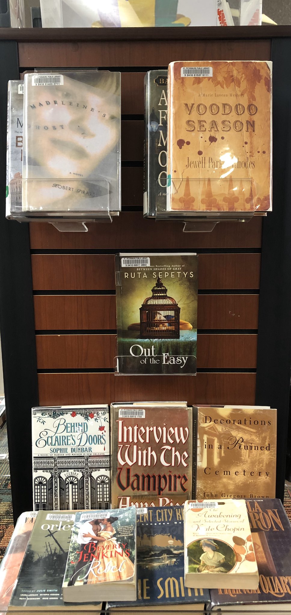 Mardi Gras book display with titles about New Orleans