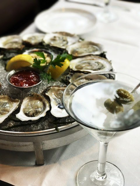 OceanPrimeBH's tweet photo. We can't think of anything better than an ice cold dirty martini and a dozen fresh oysters. Can you? https://t.co/AhDbhDzu7S