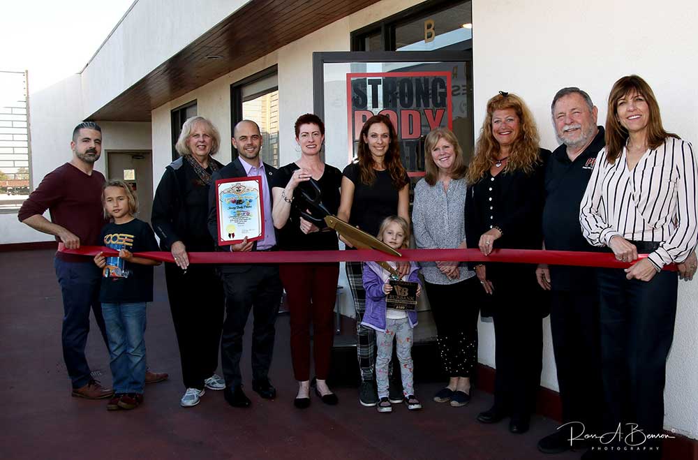 Congratulations to Strong Body Pilates <a href="/SBPilates/">Nicole Briggs</a> and owners/teachers Nicole Briggs and Keion Moradi on their Ribbon Cutting!!  Join us in congratulating these Chamber members and we wish them much success!
Photo: Ross A. Benson Photography