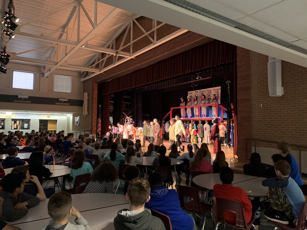 MacLeodAtNye's tweet photo. The Nye 5th Graders joined the 6th Graders at the Middle School to preview the MS musical performance “Mulan” this morning. Great performance by the cast and crew, and a great opportunity for Nye 5th Graders to support their LD peers while visiting their future school! https://t.co/CSI7H58mUA