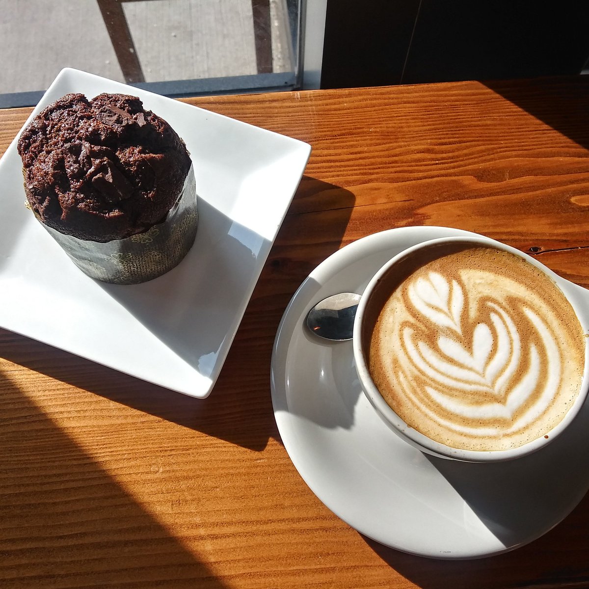 Sunny Winter's morning @OatlyUS latte and #vegan double chocolate muffin from <a href="/WestTownBakery/">West Town Bakery</a>  🌞❤️