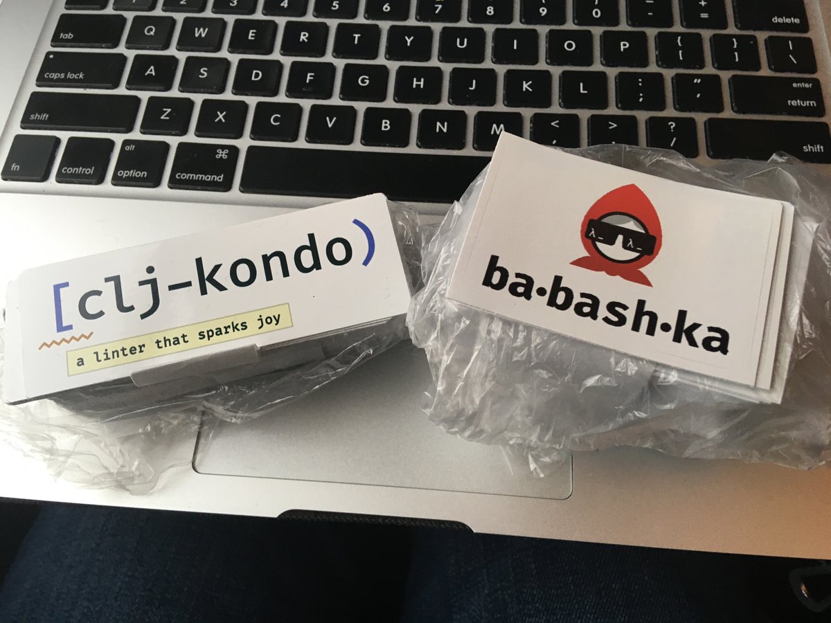 borkdude's tweet image. In the train, on my way to @clojuredconf with an exclusive supply of #babashka stickers and a small set of remaining clj-kondo stickers! #clojured