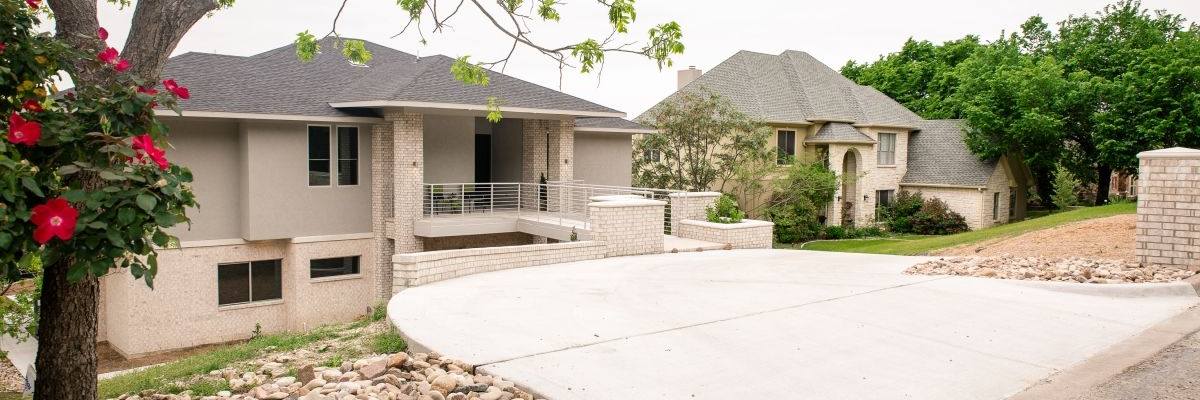 This spectacular home is built into the hillside!!! The bridge entry way is one of the best features by far!!!