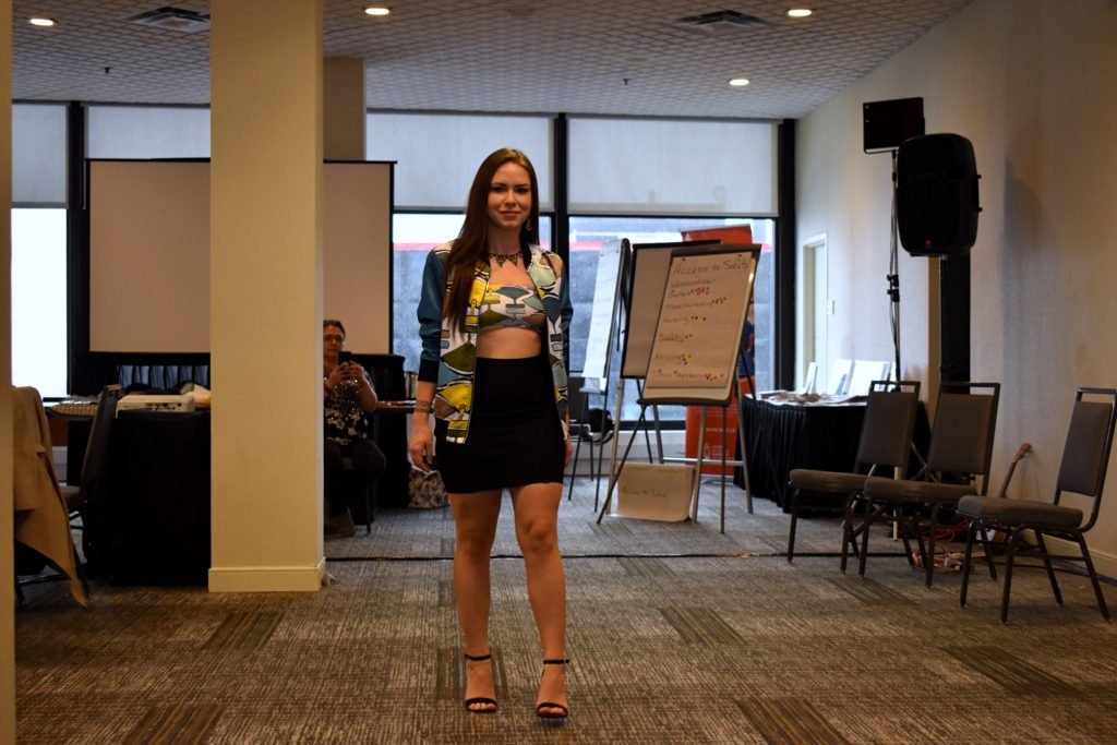 A model showcasing a design by Nunavut designer Martha Kyak’s brand, InukChic, struts down a makeshift runway at the annual general meeting of Pauktuutit Inuit Women of Canada in Ottawa on Wednesday, Feb. 26.