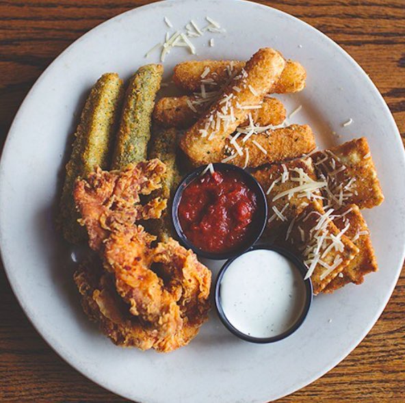 Can’t decide what to eat? 🤔 Have it all—come devour our Sampler Platter today! 🧀🐔🤤