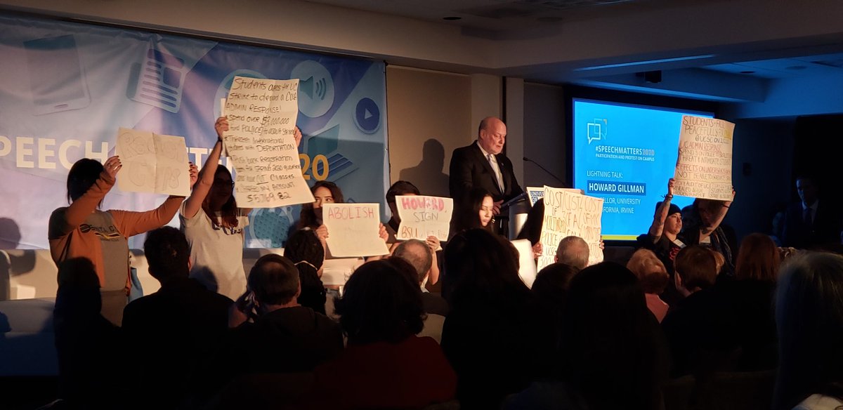 VOCalcomm's tweet photo. It's an extraordinary moment here at #SpeechMatters2020, as protesters demonstrate against @UCIrvine Chancellor Howard Gillman, who in turn honors and DEFENDS their right to protest... and opens up a panel on "Protest and Distuption on Campus"! #speechmatters
@goACTA https://t.co/RDg9cTiaFp