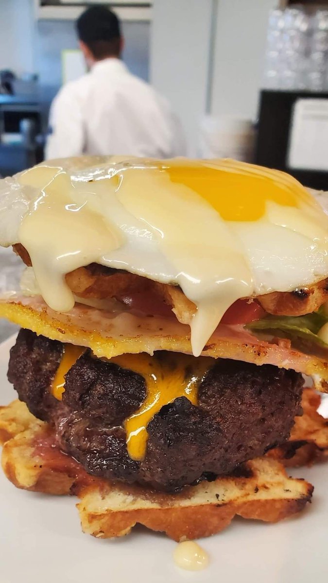 Have you tried Chef Curtis' Maple Sunrise? Our second Mini Burger Battle contestant

A maple infused houseground beef patty, with maple aioli, peamel bacon, cheddar, lettuce, tomato, stacked between a brown sugar waffle, topped with a sunny-side-up egg. Available until Feb 29
