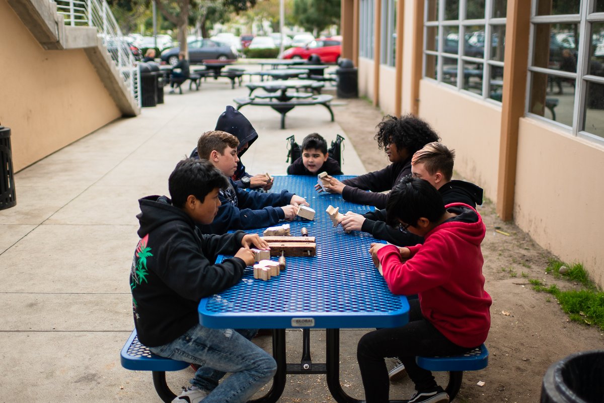 Students whittling while talking about their favorite movies #community #HTMMA #makersgonnamake