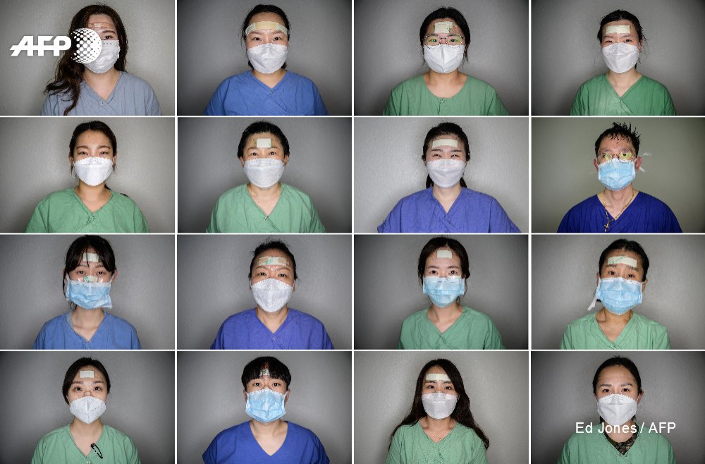 AFP's tweet photo. Bandages of honour.

Photo essay by @AFP's @edwardesjones captures the pads, plasters and tape covering the sores on the faces of South Korean nurses who spend hours tending to #coronavirus patients 

https://t.co/DKwVJDVtv7 https://t.co/x6mpydENVt