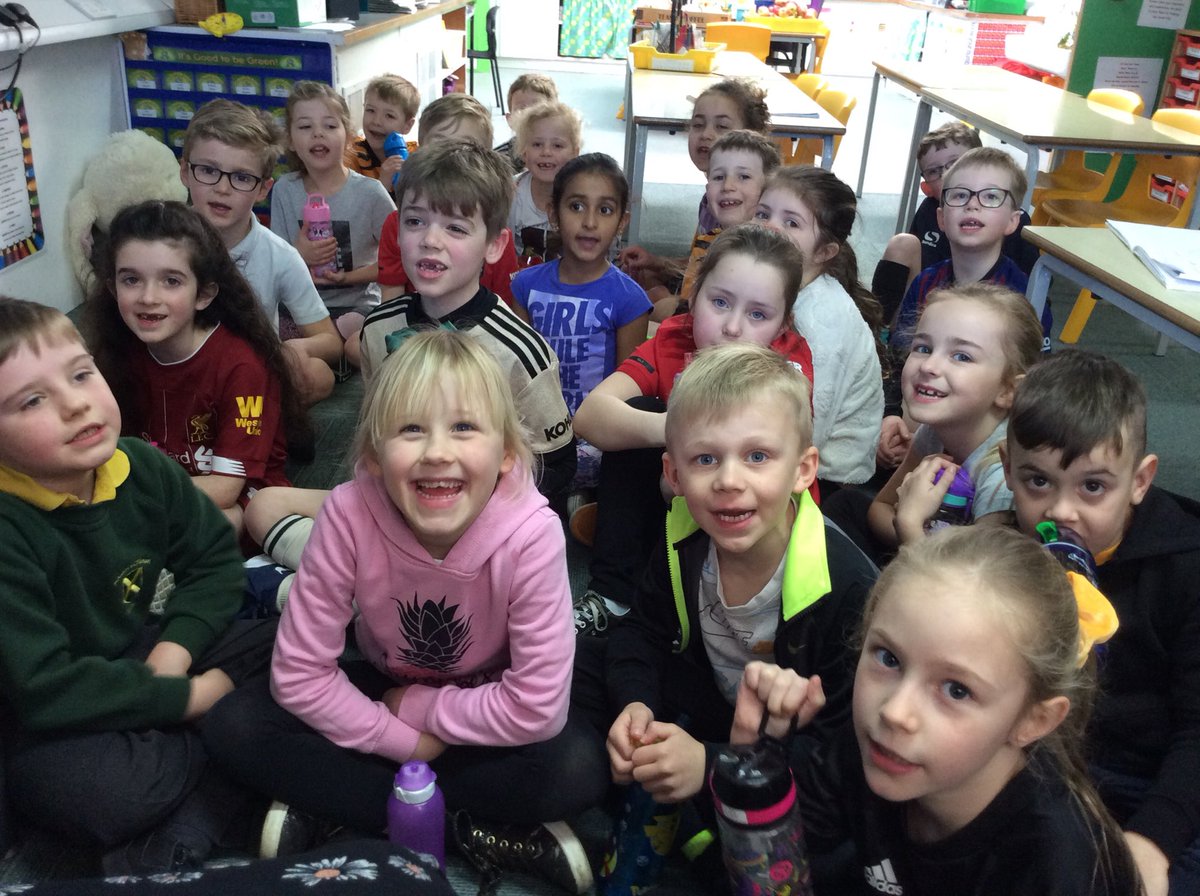 Class 2M having a well-deserved drink and a rest after completing a mile for Sport Relief.