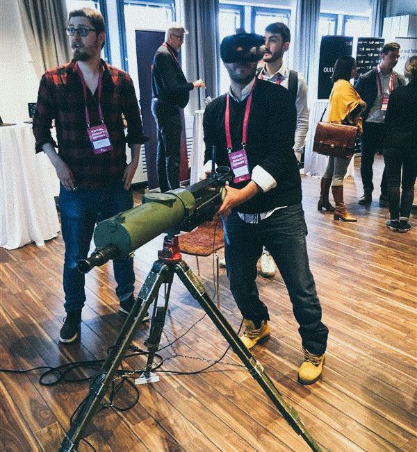 HelsinkiXR's tweet photo. @VR_Nordic - Virtual Reality Nordic 2020 demos in action:

@MekiwiLtd + @varjodotcom = interesting new input methods for VR applications. It’s always fun to shoot down planes, while standing comfortably at the office. 
#VRN2020 ⚡🛩️ https://t.co/jVGcspA7Mm