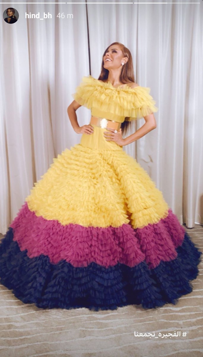 NorahAlhumaid2's tweet photo. The beautiful @hind_bh2 wore #Norahalhumaid yellow Ruffles couture dress for her Concert in the third night of Fujairah International Arts Festival.

#FIAF2020
#الفجيرة_تجمعنا
#نورة_الحميد https://t.co/g7TqtTdQie