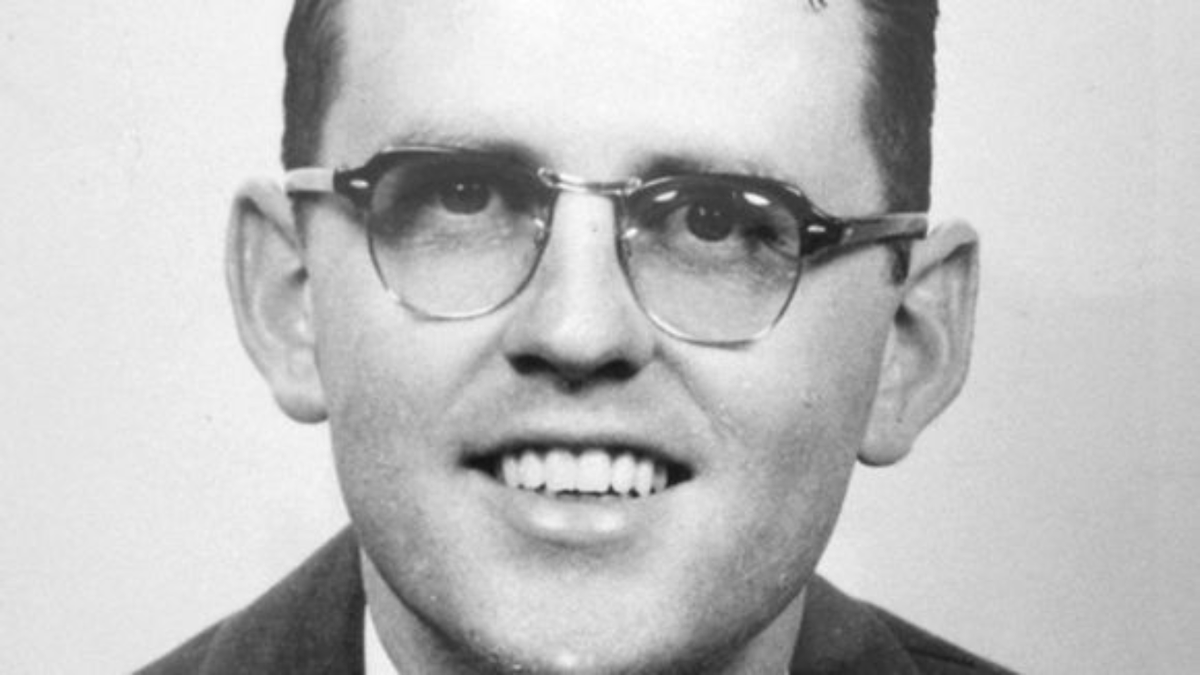 A photograph of Rev. James Reeb looking into the camera, wearing glasses, and smiling.
