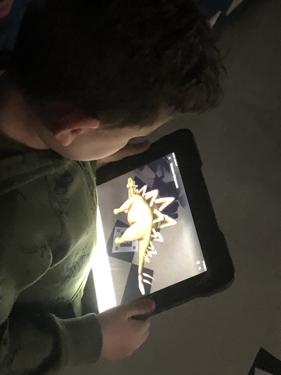 Mrs_Abels's tweet photo. 🦖Dinosaurs visited kindergarten room 108 @wmpennelem today through augmented reality! Look at those SHARP teeth, SPIKED backs, BIG claws! #usingadjectives Thanks for all the help @MrHartnett212! 🦕 https://t.co/bdHDd4CDtj