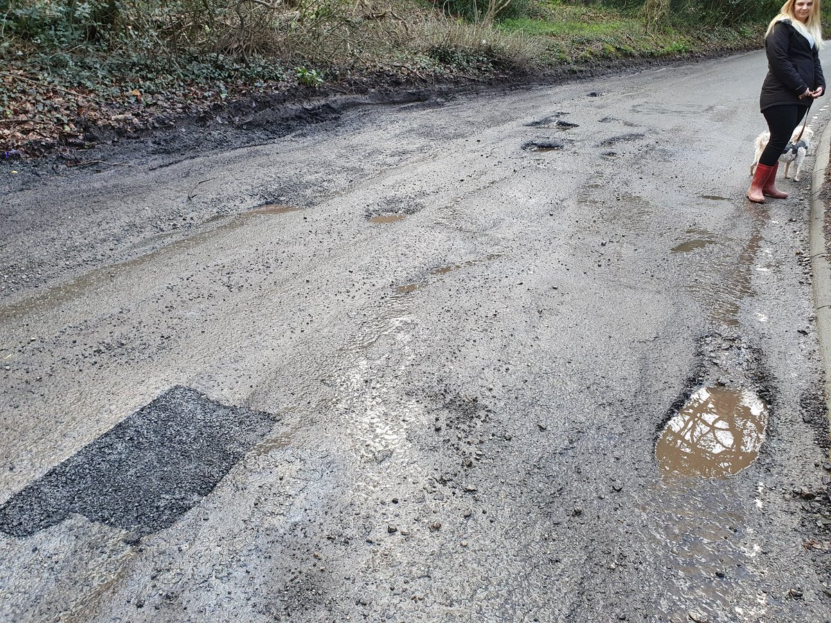 Wilderness121's tweet photo. @SurreyCouncil @finkcreative @surreycouncil The problem is that you report one and they don't fix the ones next to them.  The system is rotten.  Surrey use an unqualified supplier to fix their potholes and the temporary repairs are rarely fixed properly.  The system needs to change. https://t.co/zB9eBrYnnn