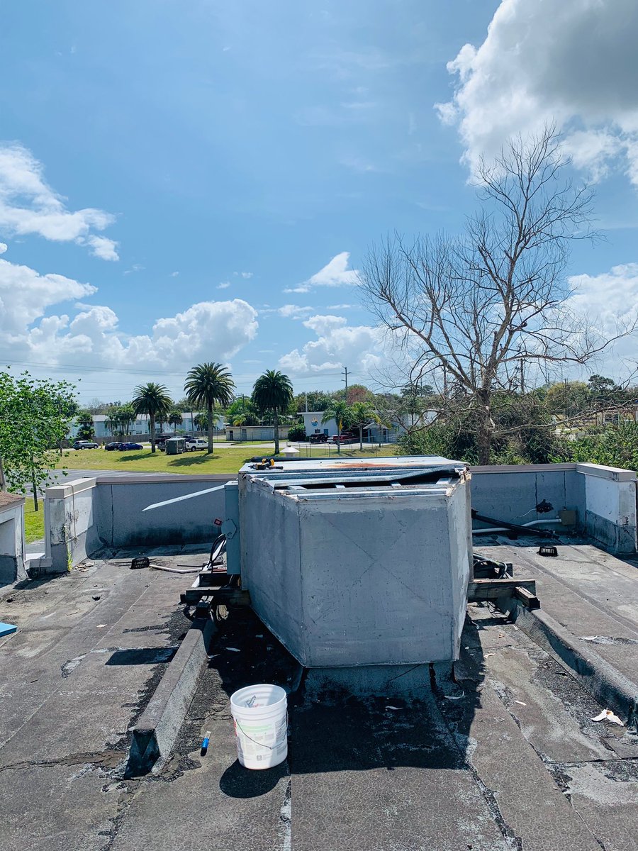 Removal of a 20 ton split system in preparation for a New 20 ton package unit by my partner Carlos and me