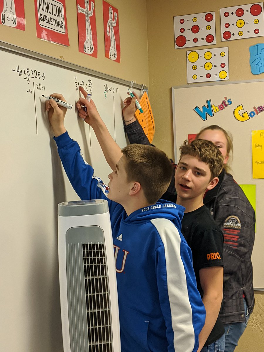 MrsKrystenClay's tweet photo. Brave volunteers to solve problems on the board! Inequalities aren't *that* scary, right?? #SeventhGrade @USD482Dighton @SummitSpark https://t.co/ZSIJ55BBuy