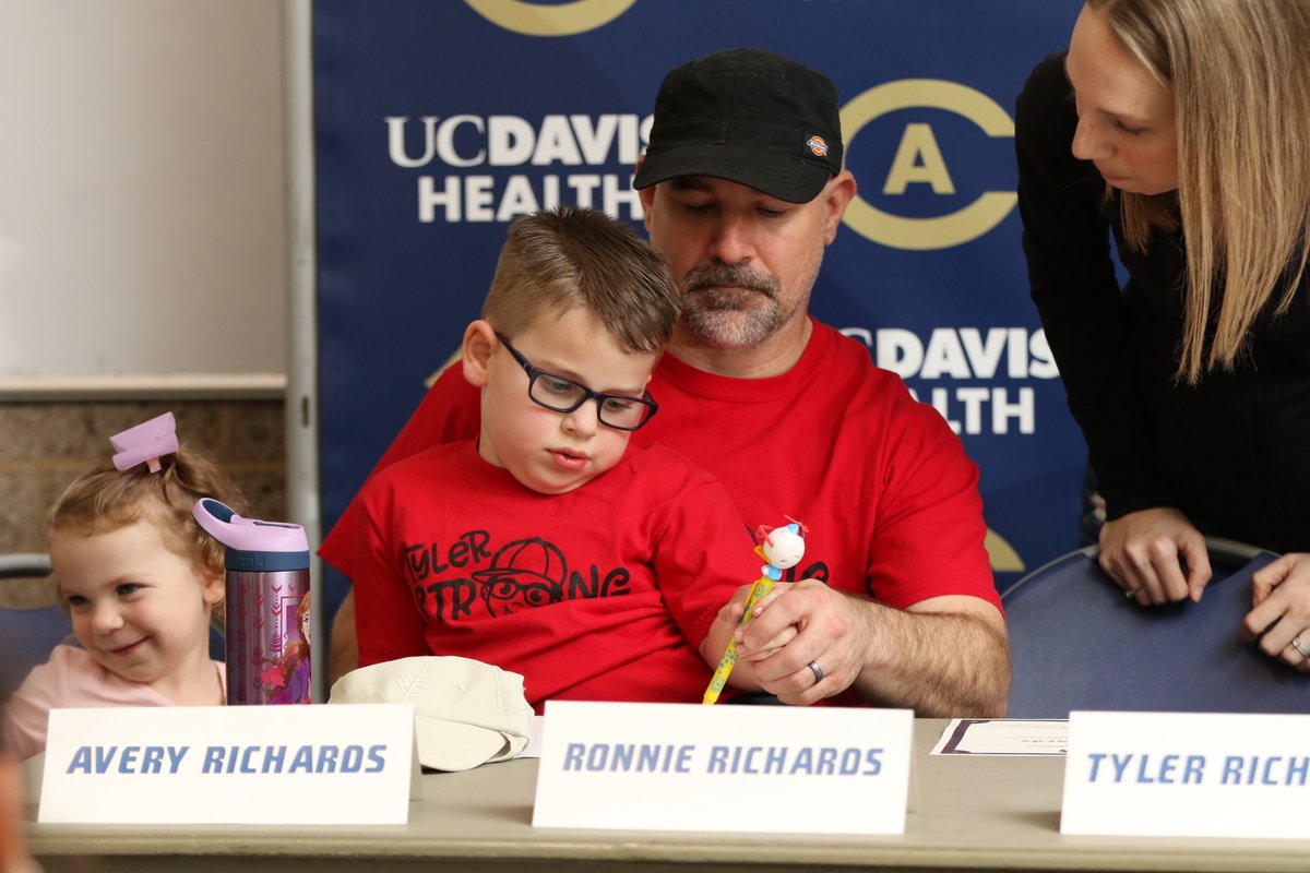 FoJFoundation's tweet photo. Let's give a big FOJ welcome to this warrior! Tyler is adopted by @ucdavislax! He was welcomed onto the team with so much excitement & love. Since his adoption ceremony, Tyler attended his first lacrosse game & cheered his teammates to a WIN! Way to go, Tyler!#FOJPride https://t.co/VTIPWiMgwC
