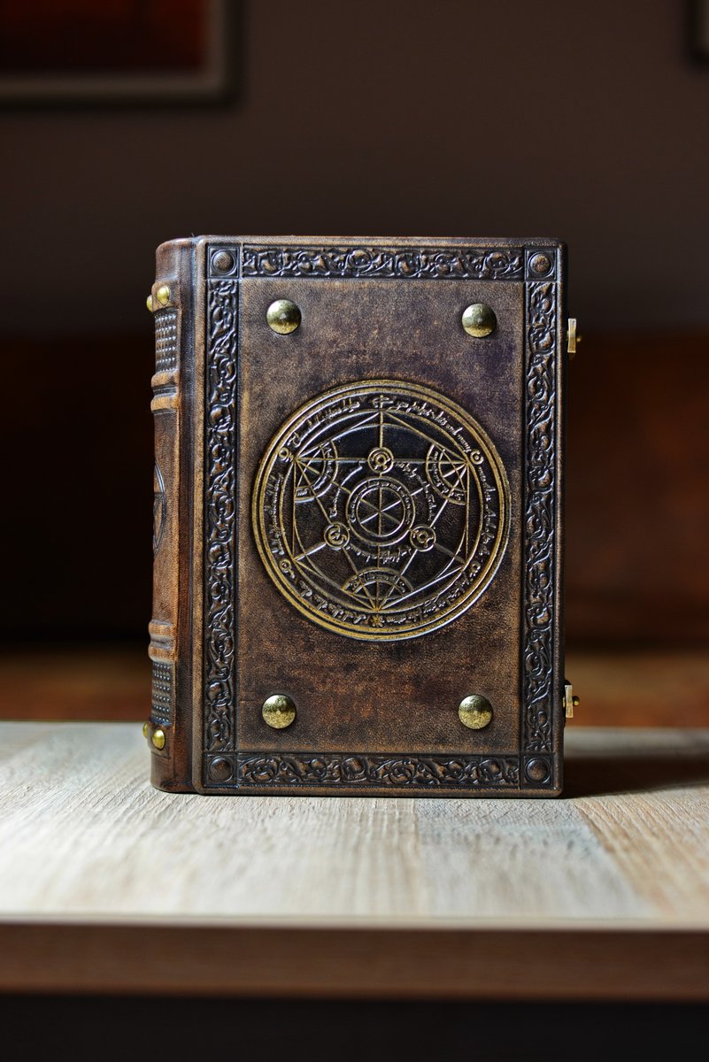 aLexLibris's tweet photo. 8" x 10" large leather journal with the gilded transmutation circle
#medieval #art #transmutationcircle #pagan #necronomicon #grimoire #bookofshadows #knowledge #book #journal #leatherwork #leatherbook #leather #gilded #alchemy #fullmetalalchemist #magick #esoteric #wisdom https://t.co/S8WC0z12Bb