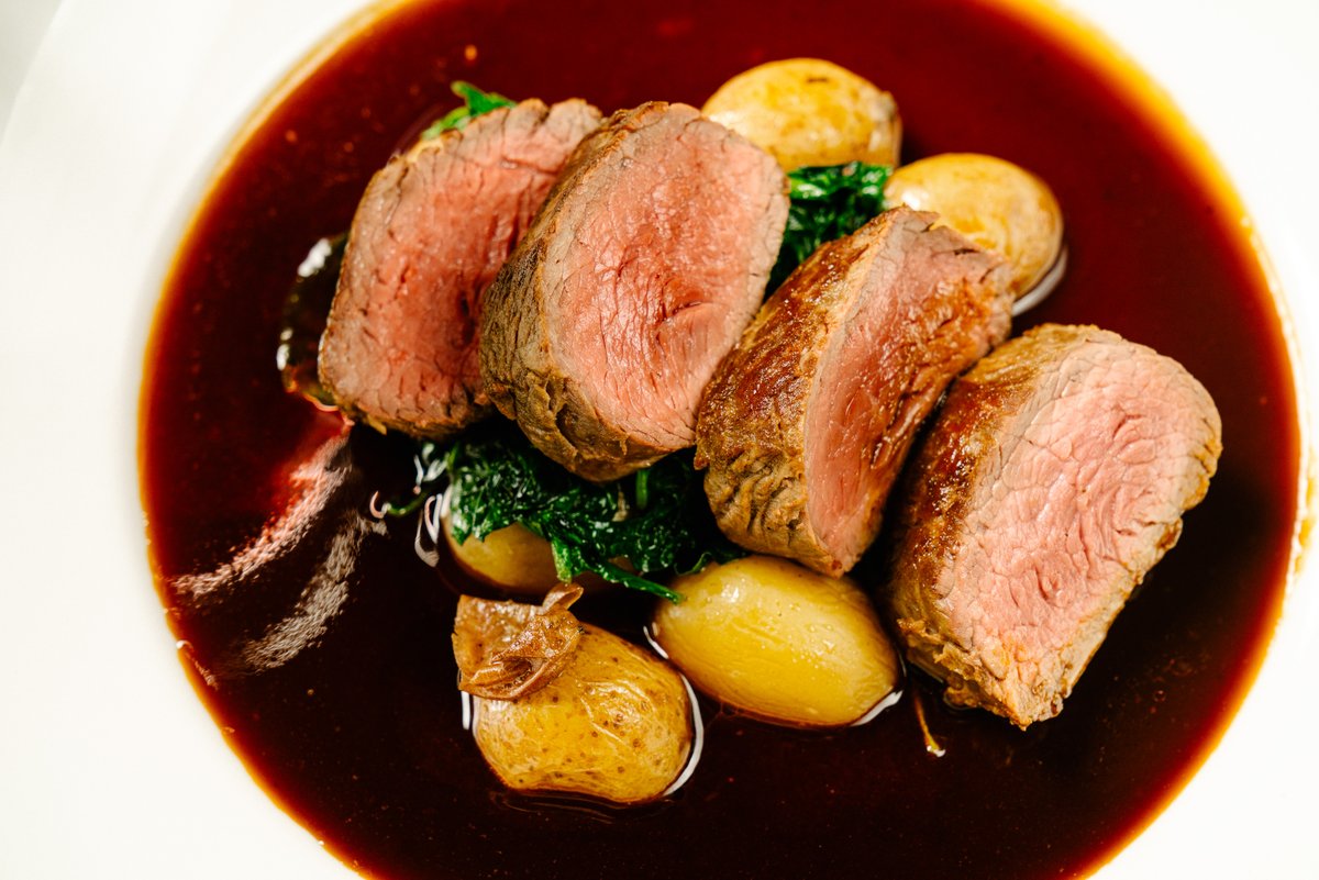 CityTable's tweet image. Perfectly cooked and sitting pretty: pan-roasted beef shoulder with marrow butter, duck fat potatoes, lemony greens, and bordelaise sauce. 
(Seriously though, how perfect is that color!?)