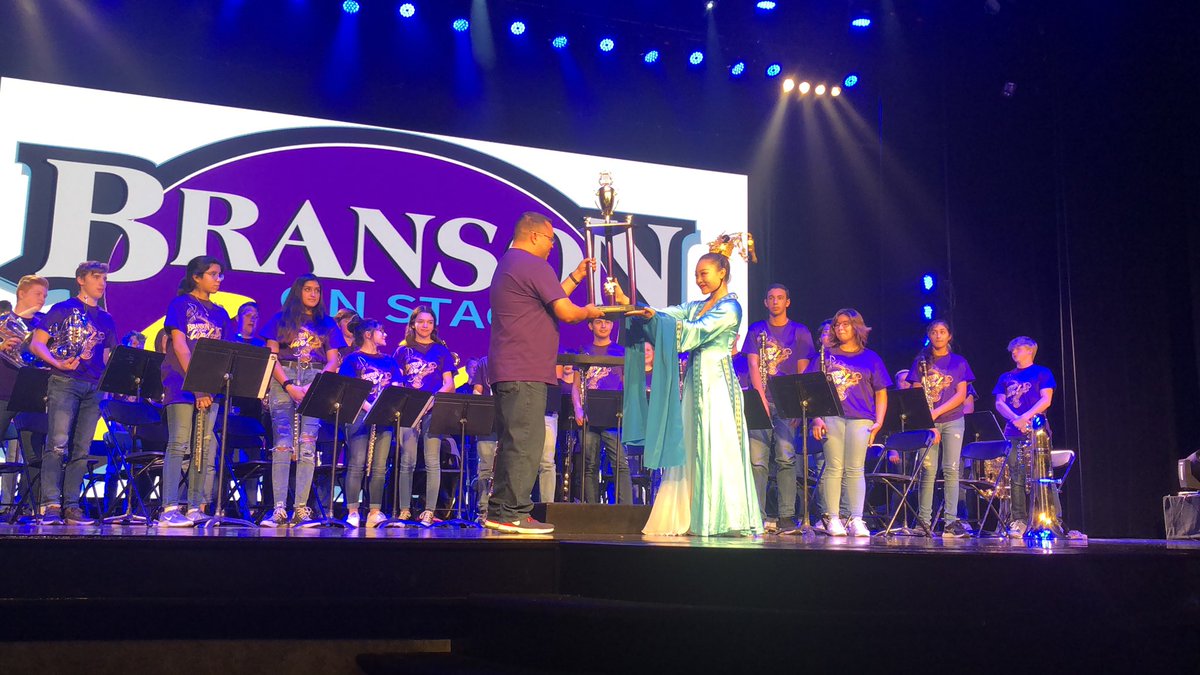 LedbetterAngie's tweet photo. The Tomball Cougar Pride Band just did a fantastic job performing on stage as the preshow entertainment for the Acrobats of Shanghai show in Branson, MO!  @TISDTHS @BandTomball https://t.co/nQQ9hl4Kks