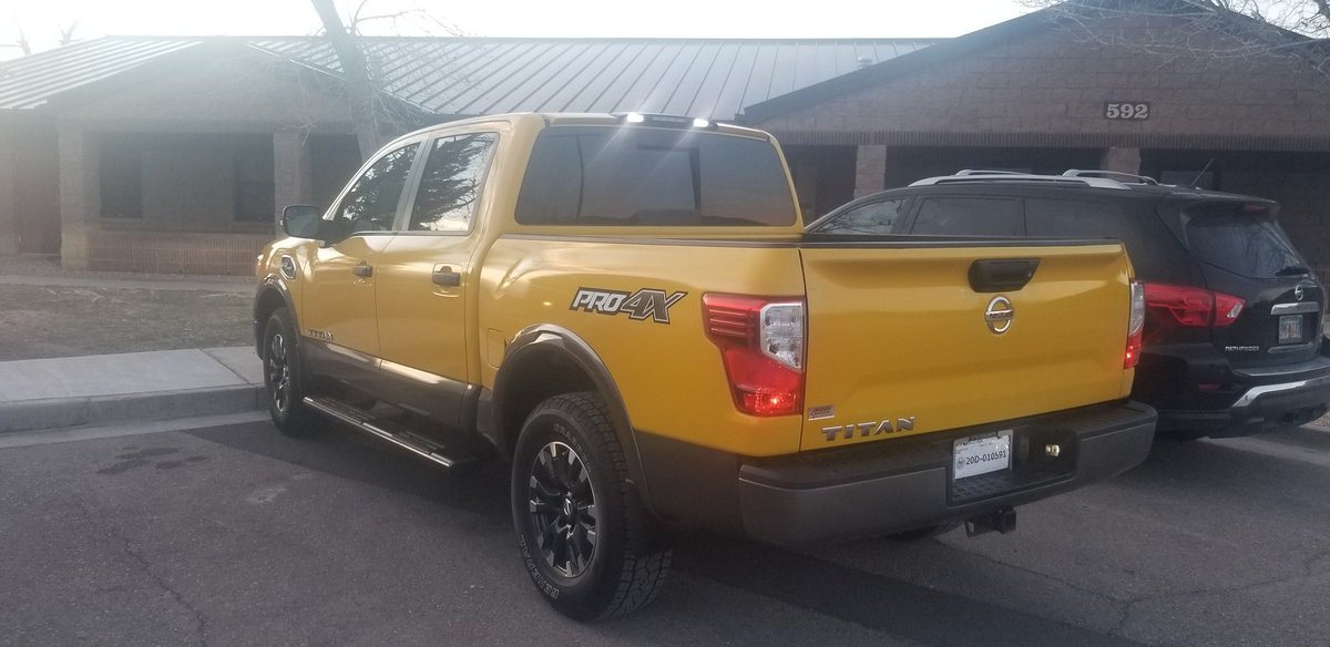 Howkstanding's tweet photo. @TaxSlayer #taxslayersweepstakes Just bought my dream truck! #nissantitan https://t.co/ddIvXQEyTG